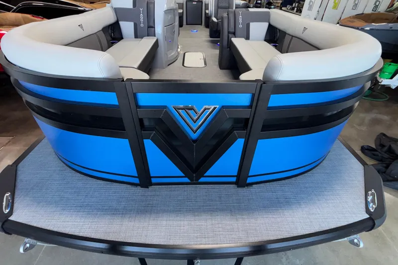 Slide: The Image of 2026 Viaggio Z24U pontoon boat with blue and black design, spacious seating. - 4