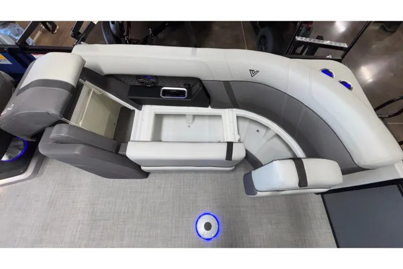 Slide: The Image of Interior of 2026 Viaggio Z24U boat with gray seating and storage compartments. - 41