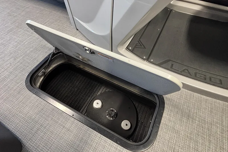 Slide: The Image of Open storage compartment in Viaggio Z24U 2026 vehicle interior. - 44