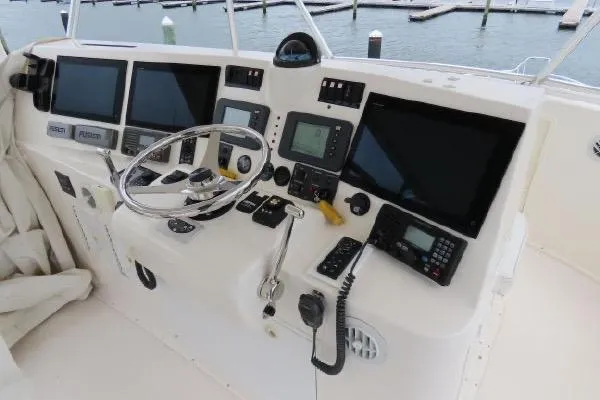 Slide: The Image of Helm of 2011 Henriques 42 Flybridge with advanced navigation and control systems. - 21