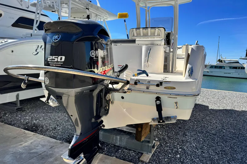 Slide: The Image of 2020 Robalo R222 Center Console with Yamaha 250 engine at marina. - 4