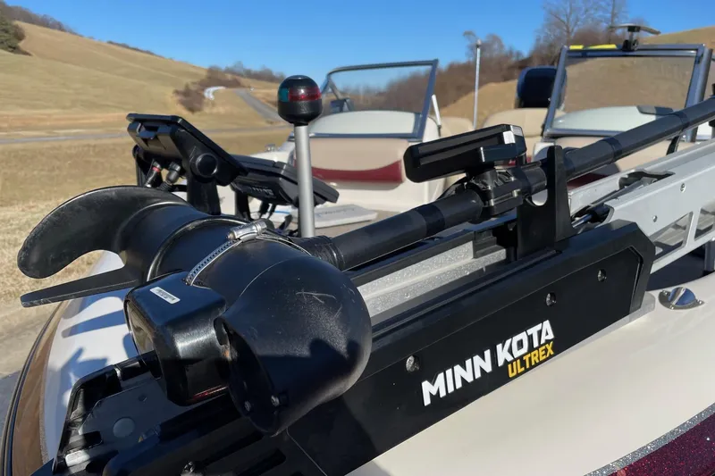 Slide: The Image of Minn Kota Ultrex trolling motor on 2006 Nitro 189 Sport boat, scenic background. - 10