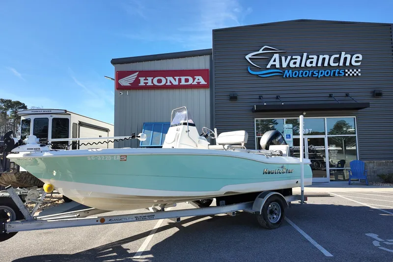 The Image of 2022 NauticStar 191 Hybrid boat on trailer at Avalanche Motorsports dealership. - 0