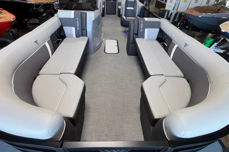 Slide: The Image of 2026 Viaggio Z24U pontoon boat interior with spacious seating and modern design. - 10