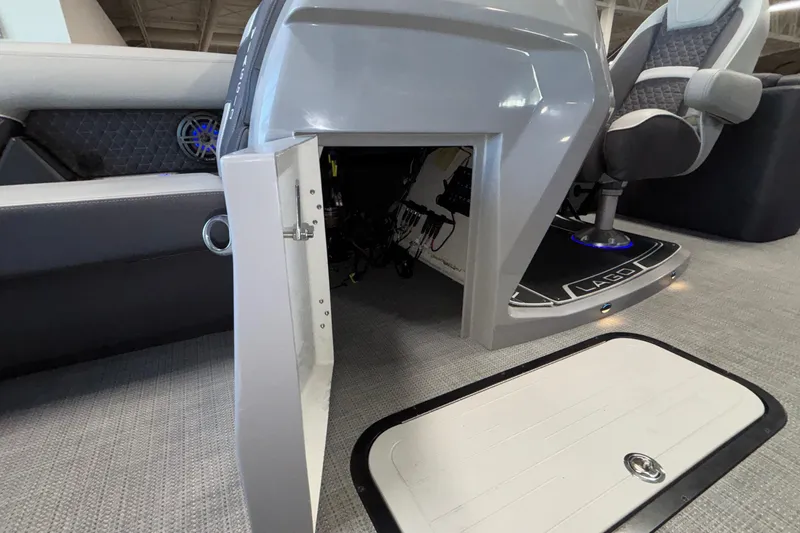 Slide: The Image of Interior view of Viaggio Z24U 2026 boat, featuring open storage compartment and seating area. - 25