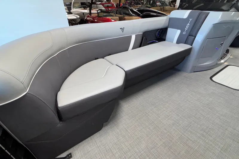Slide: The Image of Luxurious seating in the 2026 Viaggio Z24U boat, featuring sleek gray upholstery. - 11