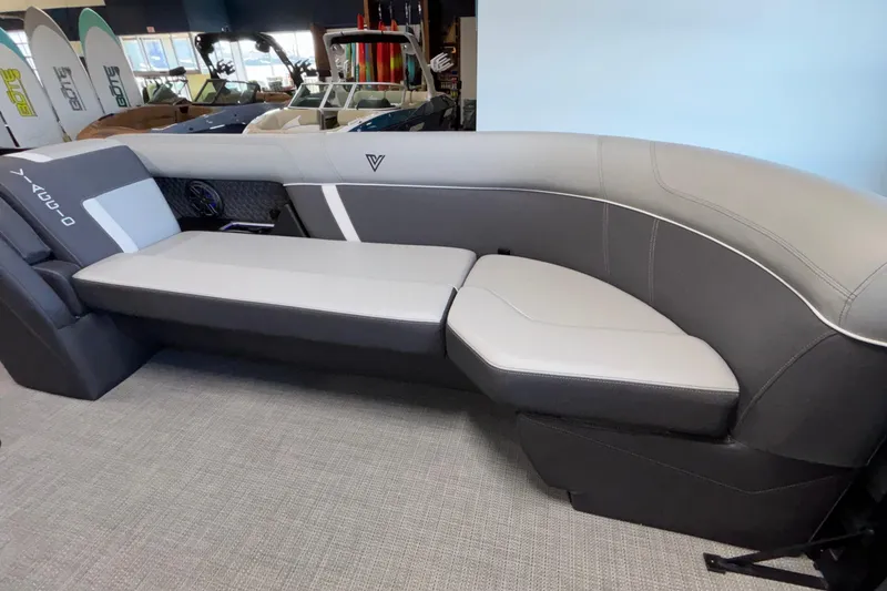 Slide: The Image of Luxurious seating in the 2026 Viaggio Z24U boat, featuring sleek gray upholstery. - 12