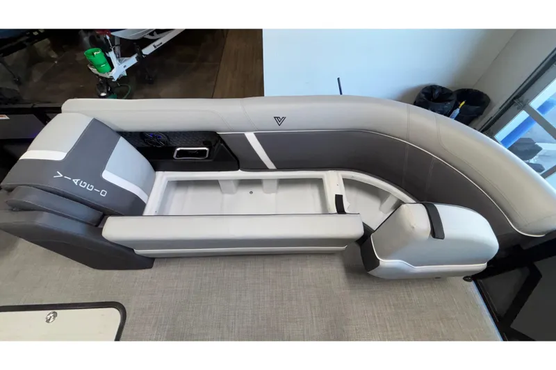 Slide: The Image of Viaggio Z24U 2026 boat interior with gray seating and storage compartment. - 15