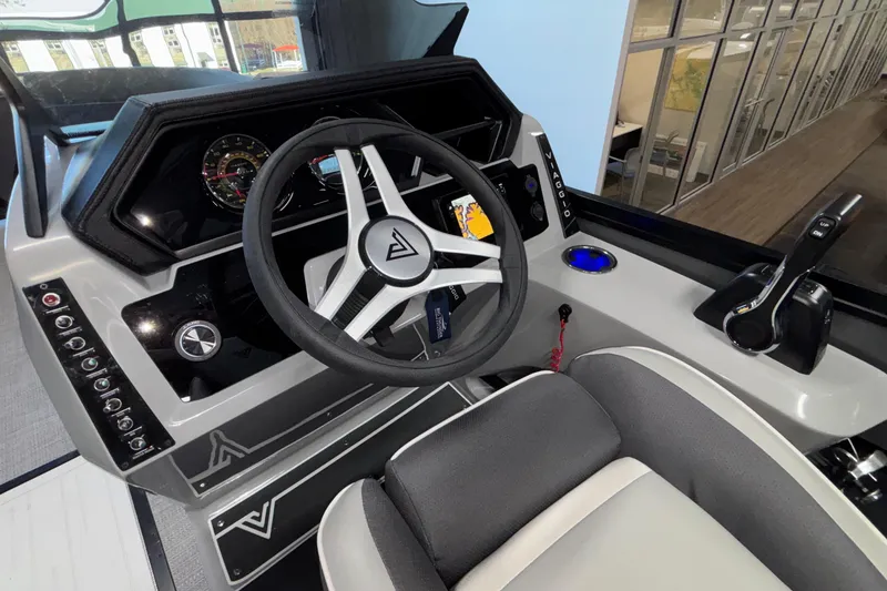 Slide: The Image of 2026 Viaggio Z24U boat dashboard with modern steering wheel and control panel. - 20