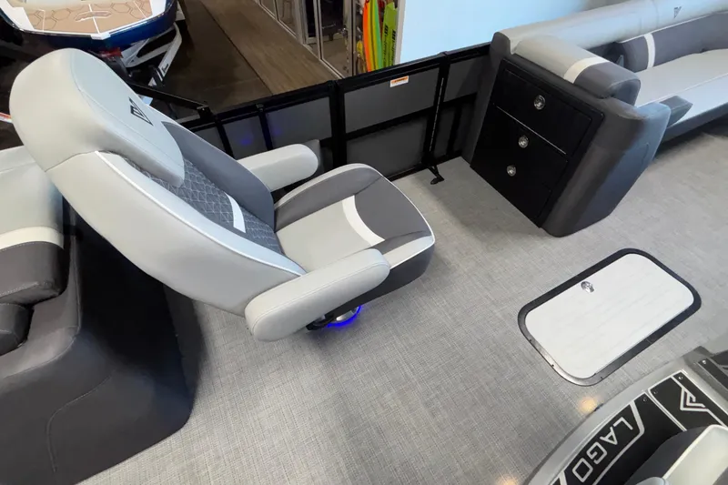 Slide: The Image of Interior of 2026 Viaggio Z24U boat with modern seating and storage compartments. - 24