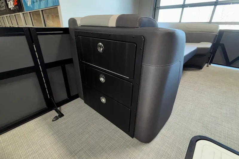 Slide: The Image of Viaggio Z24U 2026 interior with sleek black storage drawers and modern seating. - 29