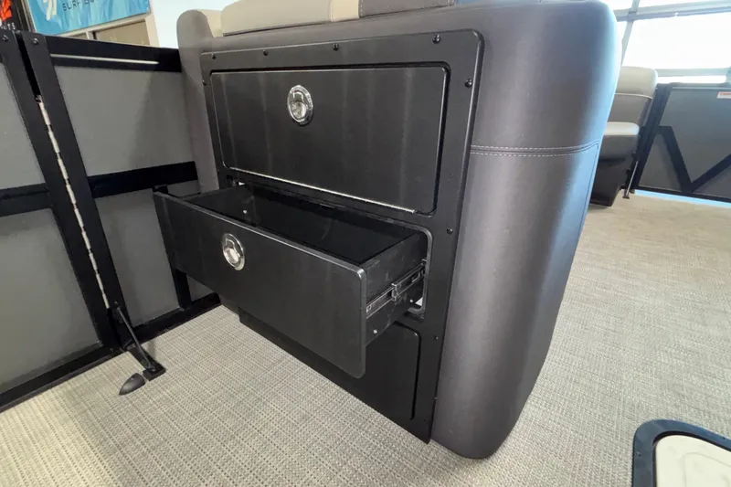 Slide: The Image of Storage compartment in a 2026 Viaggio Z24U boat, featuring sleek black drawers. - 31
