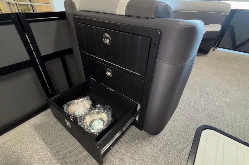 Slide: The Image of Viaggio Z24U 2026 interior storage with open drawer containing wrapped items. - 32