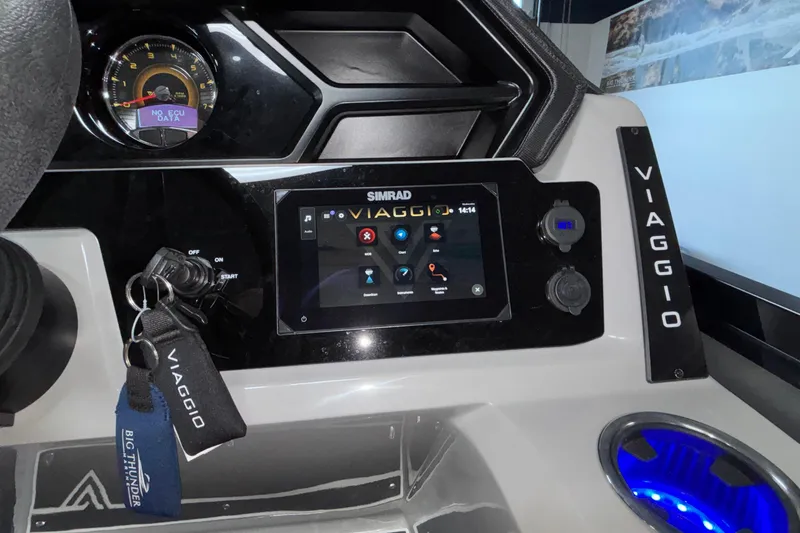 Slide: The Image of Dashboard of 2026 Viaggio Z24U boat with digital display and key ignition. - 37