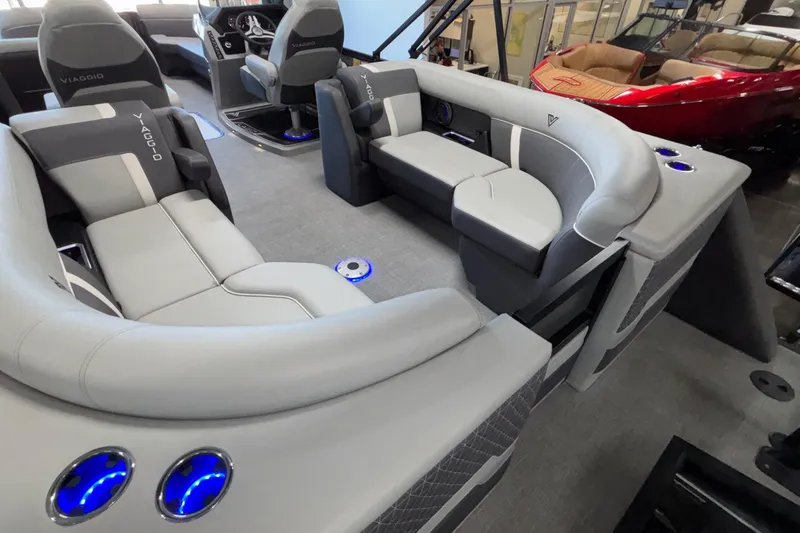 Slide: The Image of Luxurious interior of 2026 Viaggio Z24U boat with modern seating and blue LED cup holders. - 48