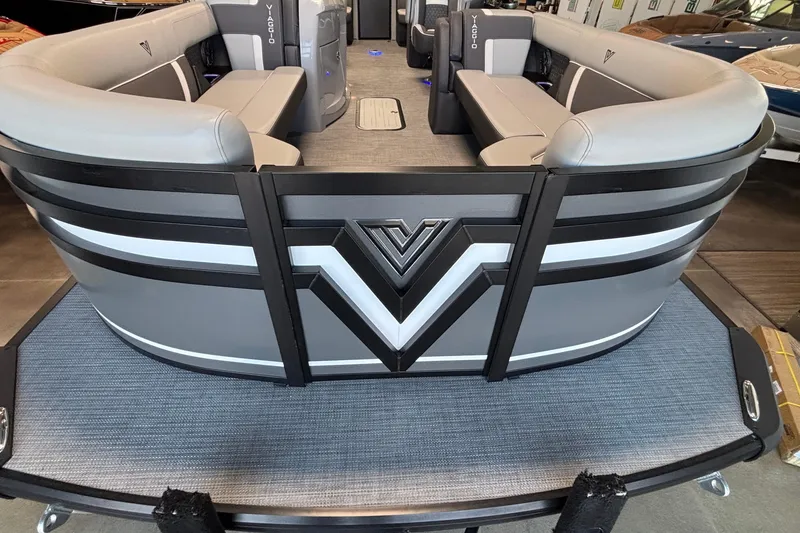 Slide: The Image of 2026 Viaggio Z24U pontoon boat with sleek gray seating and modern design. - 6