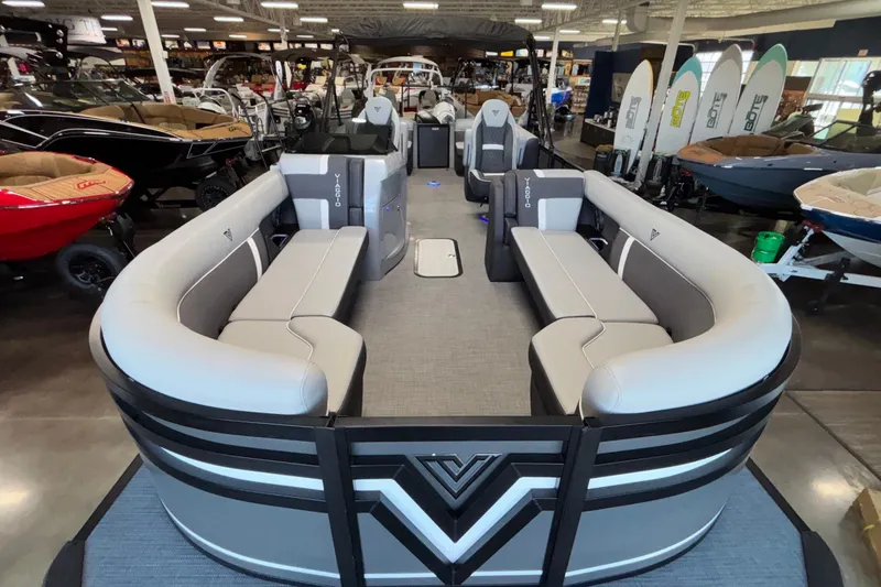 Slide: The Image of Luxurious 2026 Viaggio Z24U pontoon boat with spacious seating in showroom. - 9