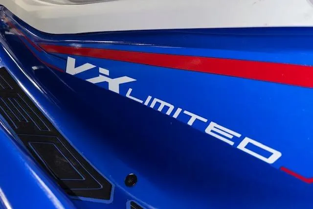 Slide: The Image of 2023 Yamaha WaveRunner VX Limited, blue with red accents, close-up view. - 20