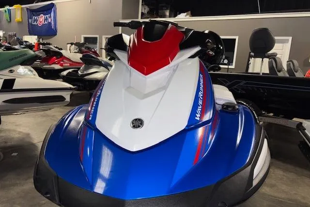 Slide: The Image of 2023 Yamaha WaveRunner VX Limited in showroom, featuring blue, white, and red design. - 4
