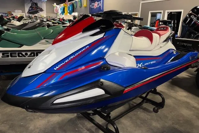 Slide: The Image of 2023 Yamaha WaveRunner VX Limited in showroom, blue and white design. - 5