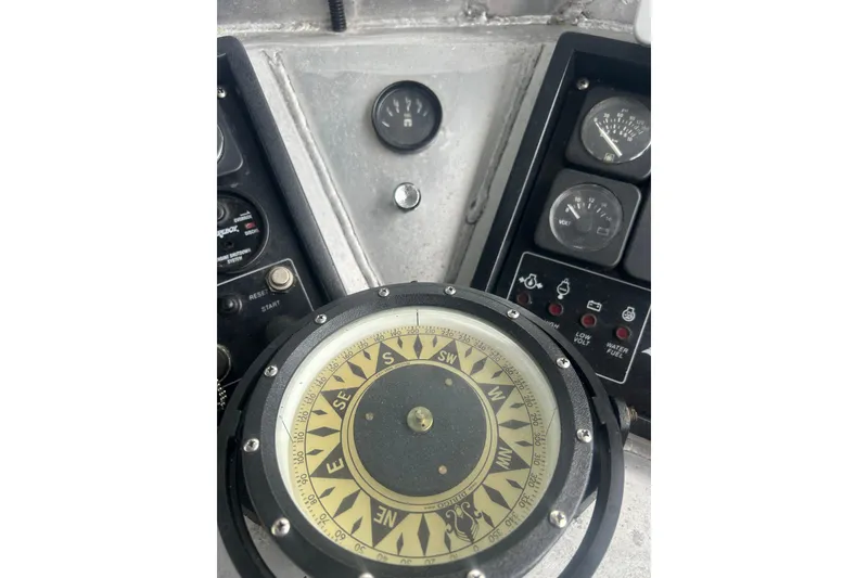 Slide: The Image of Close-up of Svendsen Marine Works SMW 38 boat compass and control panel, 1994 model. - 24