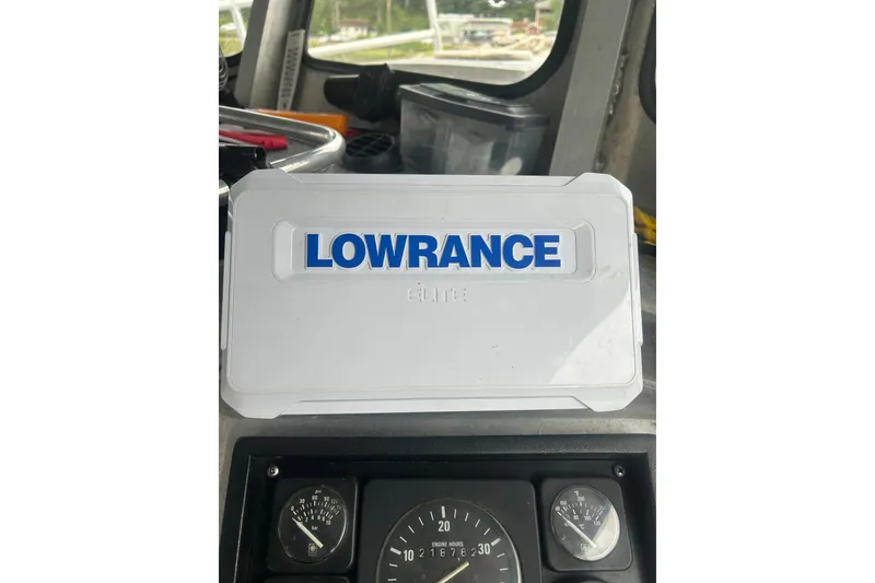 Slide: The Image of Lowrance Elite device on Svendsen Marine Works SMW 38, 1994 model dashboard. - 27