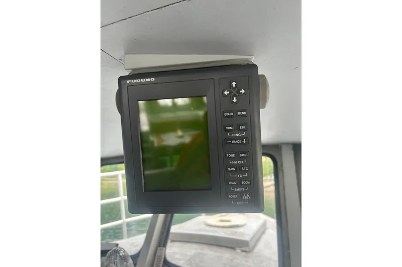 Slide: The Image of Furuno marine radar display inside Svendsen Marine Works SMW 38, 1994 model boat. - 30