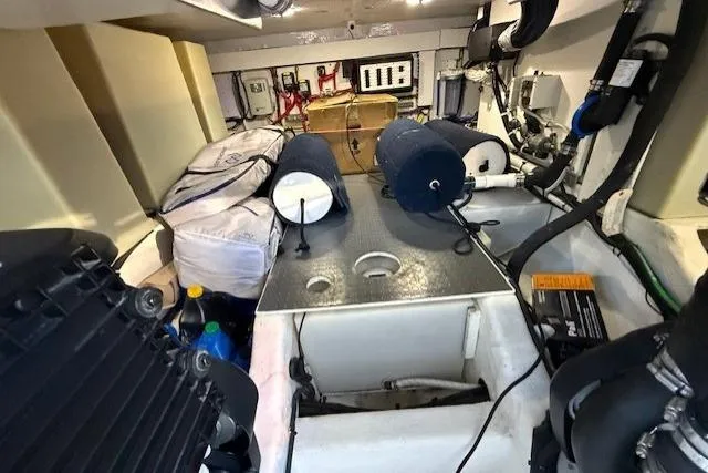 Slide: The Image of Engine room of 2013 Sabre 38 Salon Express with equipment and storage. - 37