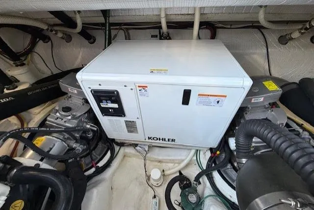 Slide: The Image of Engine room of 2013 Sabre 38 Salon Express with Kohler generator. - 38