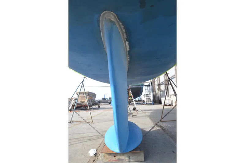 Slide: The Image of Keel of a 1999 Jeanneau Sun Odyssey 45.2 sailboat in dry dock. - 11