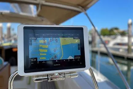 Slide: The Image of Garmin navigation system on Jeanneau Sun Odyssey 45.2 yacht, 1999 model, docked at marina. - 16