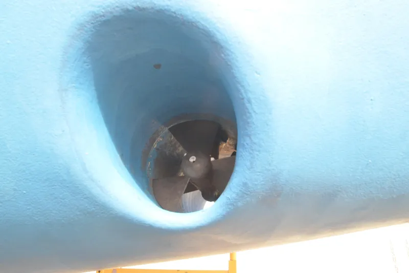 Slide: The Image of Bow thruster of a 1999 Jeanneau Sun Odyssey 45.2 sailboat, painted in blue. - 8
