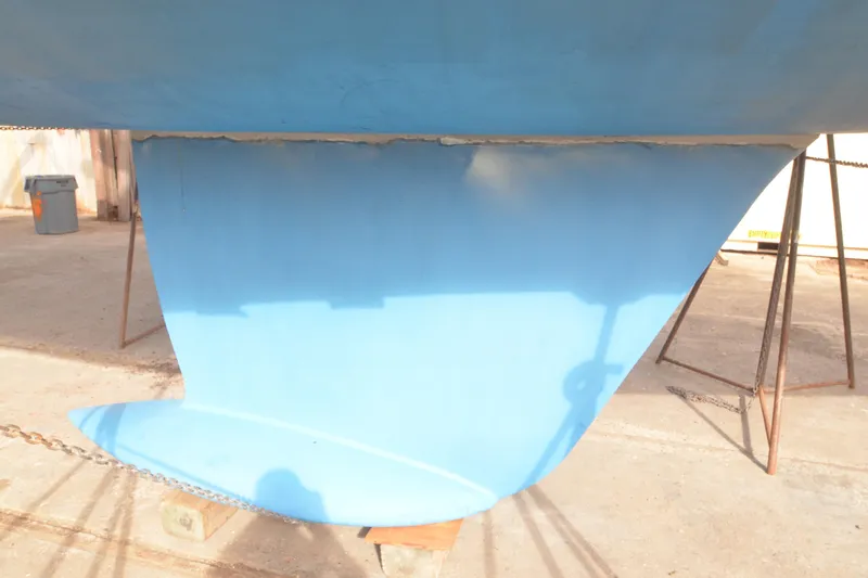 Slide: The Image of Keel of a 1999 Jeanneau Sun Odyssey 45.2 sailboat in dry dock. - 9