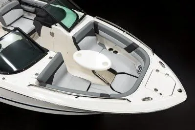 Slide: The Image of 2026 Chaparral SSX 4 boat interior with sleek seating and modern design. - 11