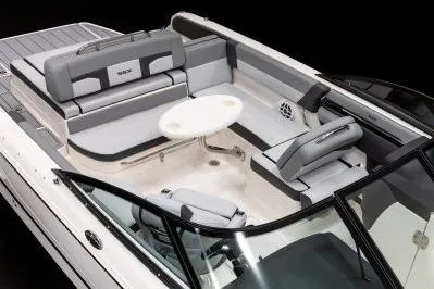 Slide: The Image of 2026 Chaparral SSX 4 boat interior with sleek seating and modern design. - 12