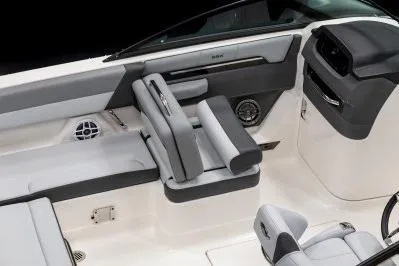 Slide: The Image of 2026 Chaparral SSX 4 boat interior with sleek seating and modern design. - 16