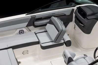 Slide: The Image of 2026 Chaparral SSX 4 boat interior with sleek, modern seating and dashboard design. - 17
