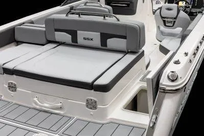 Slide: The Image of 2026 Chaparral SSX 4 boat interior with sleek gray seating and modern design. - 23