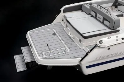 Slide: The Image of 2026 Chaparral SSX 4 boat with sleek deck and comfortable seating. - 25