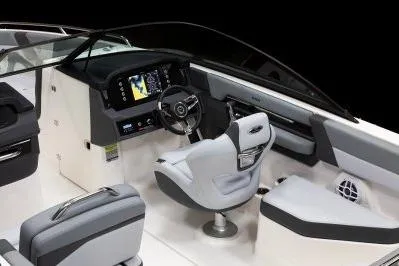 Slide: The Image of 2026 Chaparral SSX 4 boat interior with modern dashboard and seating. - 4