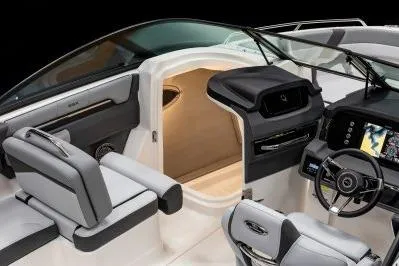 Slide: The Image of 2026 Chaparral SSX 4 boat interior with modern dashboard and seating. - 7