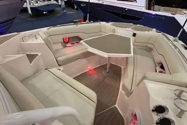 Slide: The Image of Luxurious seating area on 2026 Solara S-250 CW boat with modern table and ambient lighting. - 5