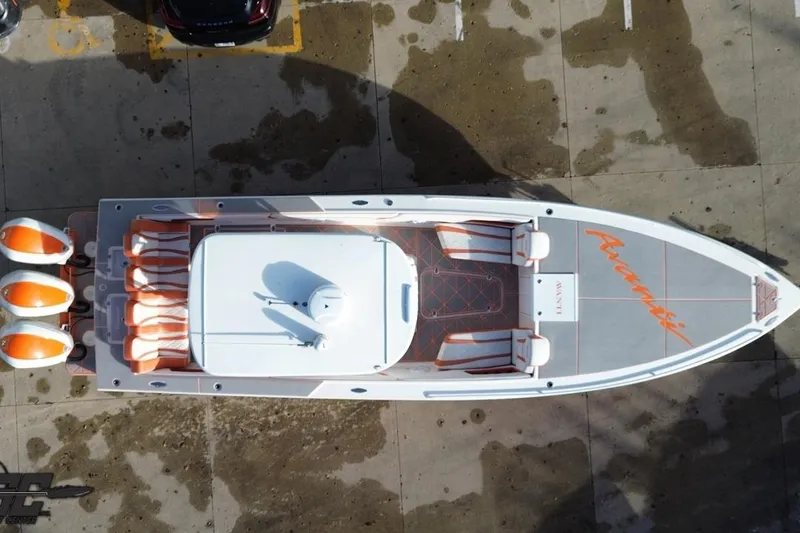 Slide: The Image of Overhead view of 2021 Avanti 36 Center Console boat with orange accents. - 21
