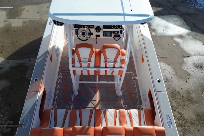 Slide: The Image of 2021 Avanti 36 Center Console boat with orange and white seating, top view. - 28