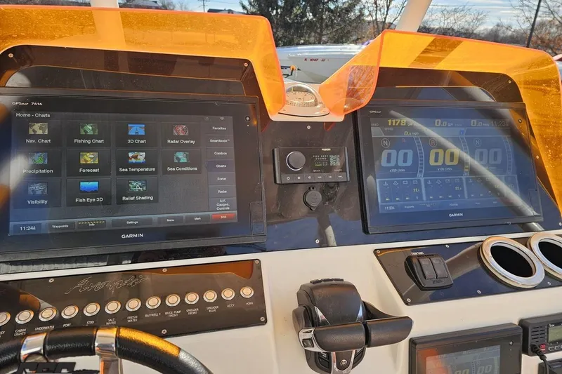 Slide: The Image of Avanti 36 Center Console 2021 dashboard with Garmin navigation and control systems. - 51