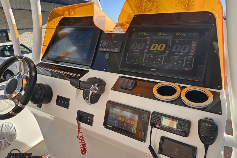 Slide: The Image of 2021 Avanti 36 Center Console dashboard with advanced navigation and control systems. - 52