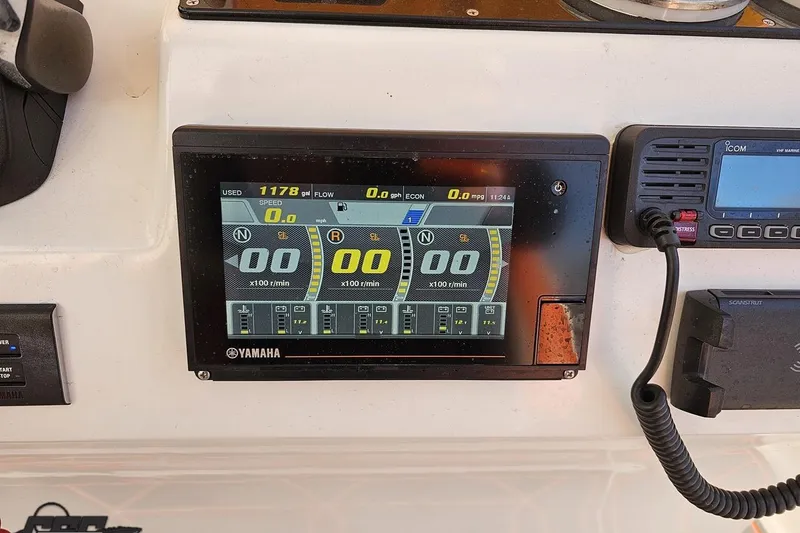 Slide: The Image of Yamaha display on 2021 Avanti 36 Center Console boat dashboard with navigation controls. - 53