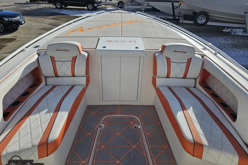 Slide: The Image of 2021 Avanti 36 Center Console boat interior with orange and white seating. - 56