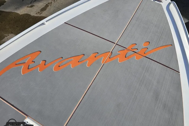 Slide: The Image of 2021 Avanti 36 Center Console boat deck with orange logo. - 64