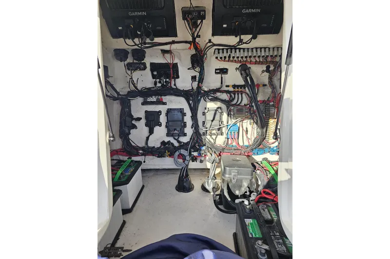 Slide: The Image of Electrical wiring and components inside a 2021 Avanti 36 Center Console boat. - 68